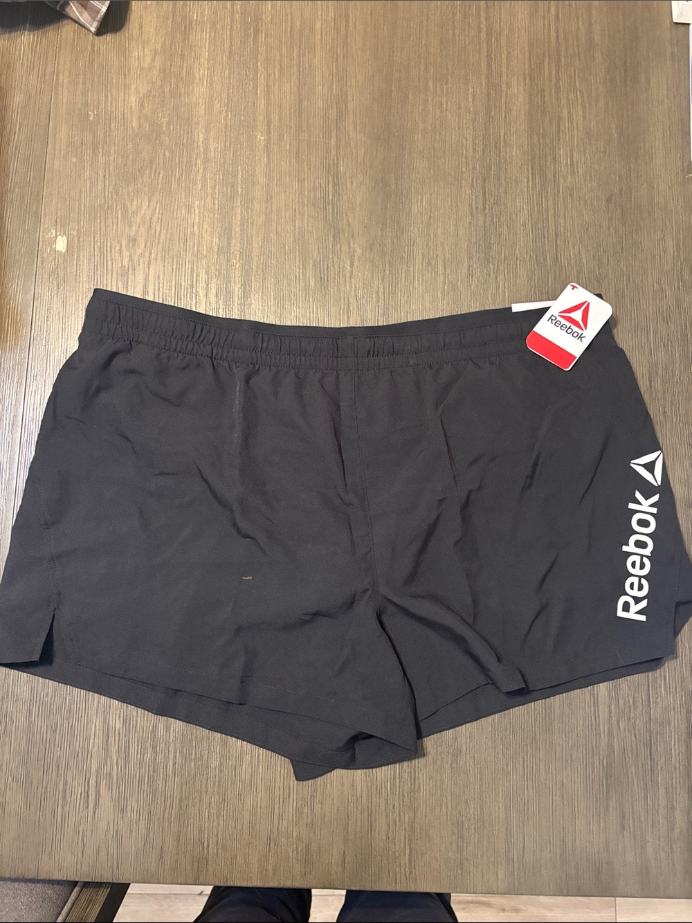 Reebok ladies Black Shorts with White Logo. Lightweight